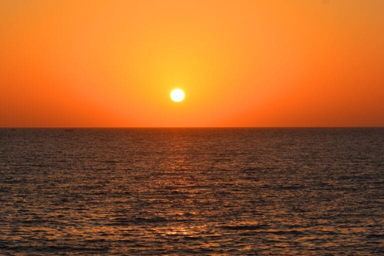 Solnedgang, horisont, hav